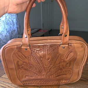 Hand-carved leather purse